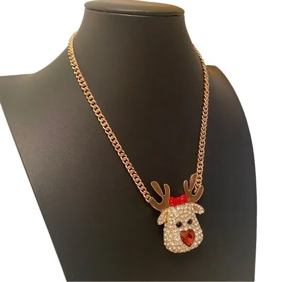 Betsey Johnson Pave Crystal Reindeer Pendant Necklace on Gold Toned Chain.